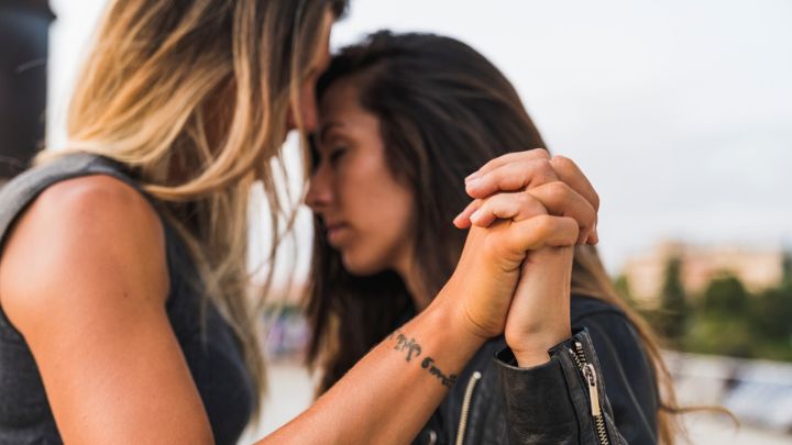 Jen and Peace are an affectionate-lesbian-couple-holding-hands marginalized, mental health issues, LGBTQ+, Multicultural, identity, belonging and race. Jenand Peace are an affectionate-lesbian-couple-holding-hands marginalized, mental health issues, LGBTQ+, Multicultural, identity, belonging and race.